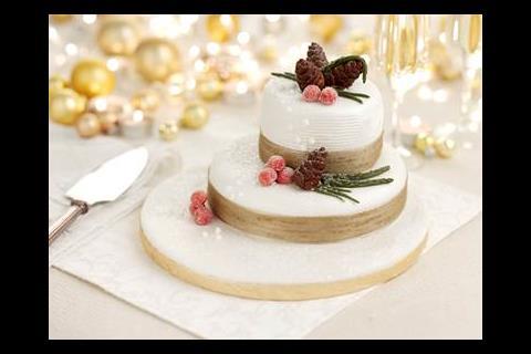 Tesco has made just 4,000 of its finest* Two Tier Winter Enchantment Cakes. Packed with whole almonds, roasted hazelnuts and dried fruit then soaked in French brandy, the cakes have been topped with frosted pine cones and winter berries.